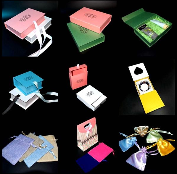 Logotipo grabado en relieve metálico de la caja de regalo de Papercraft del color para el empaquetado de la ropa del bebé