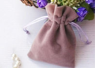El OEM mantiene el material suave de la tela del color del terciopelo de las bolsas puras de la joyería proveedor