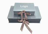 Logotipo grabado en relieve metálico de la caja de regalo de Papercraft del color para el empaquetado de la ropa del bebé proveedor