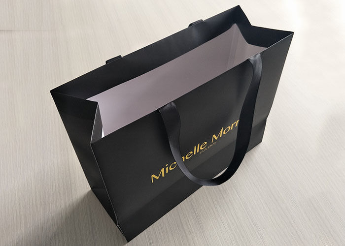 Delicado robusto impresa boutique de papel negro reciclable de los bolsos de compras proveedor