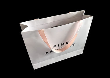 China La aduana plegable imprimió los bolsos, bolsos de compras del boutique con el lujo de la manija de la cinta fábrica