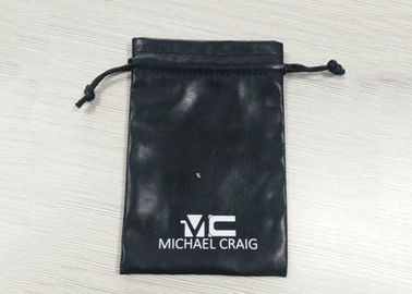 China Bolsos coriáceos negros de la joyería del lazo, logotipo de la impresión de la pantalla de la bolsa del lazo del ante fábrica